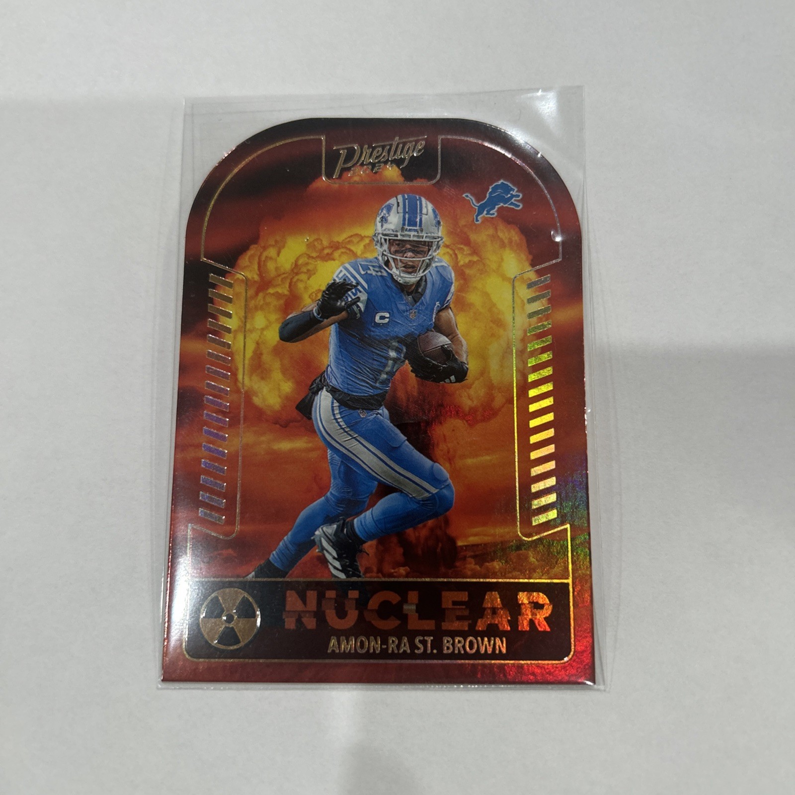 2024 PANINI PRESTIGE (#N-ASB) - NUCLEAR INSERT (SSP) - AMON-RA ST. BROWN