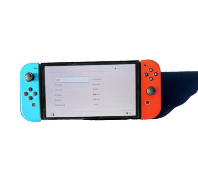 Nintendo Switch OLED 64GB SPLATOON 3  with red and blue joy cons-very good