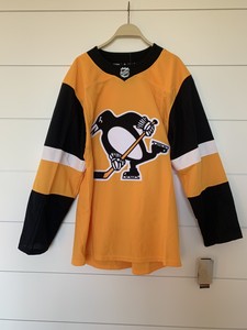 penguins gold jersey