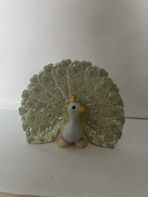 Precious Moments figurine titled ''You Should Be Proud As A Peacock''