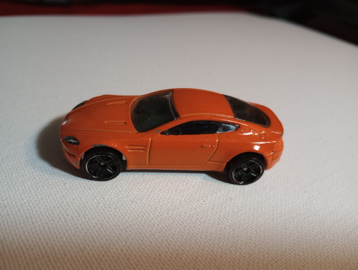 2010 Hot Wheels Mystery Aston Martin V8 Vantage Orange PR5s LOOSE