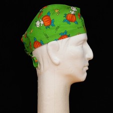 Peanuts Gang Snoopy Halloween Pumpkin theme green scrub hat