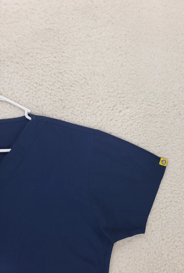 Top para mujer WonderWink grande azul mezcla de algodón manga corta cuello en V ropa exfoliante Foto 3 de 4