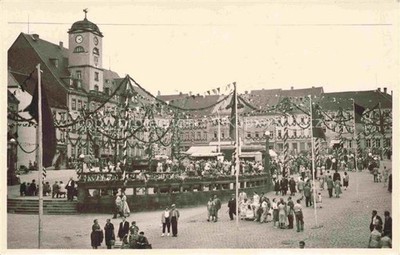 Monastery book Leisnig Saxony marketplace town hall clock tower home festival garlands Fe