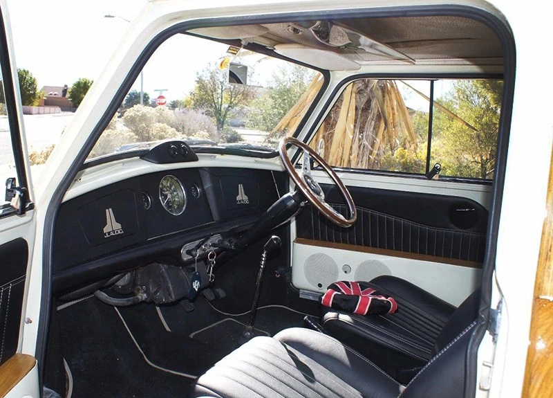 The seats are out of a Miata, and the stereo is well hidden.