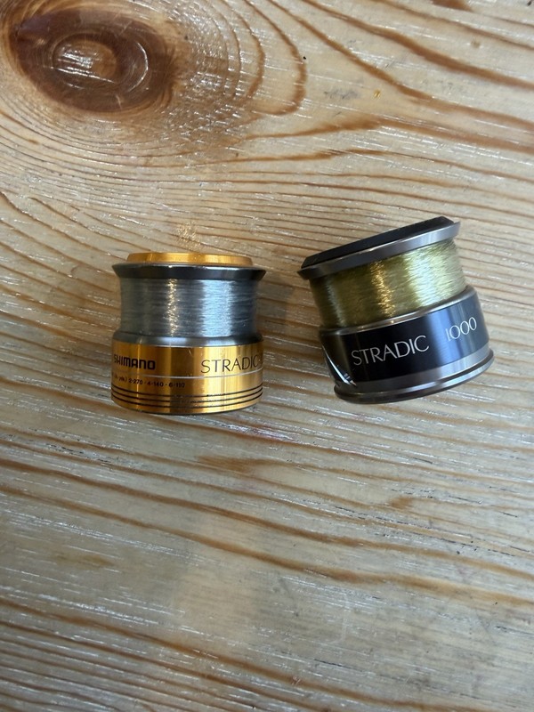 Two Shimano Stradic Spare Spool 1000 Size reel 