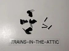 LIONEL COUPLER PLASTIC KNUCKLE WITH SPRING 9050-56 4 PIECES WITH 4 TC-23 RIVETS.