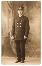 RPPC Trolley Motorman #117 in Uniform with Hat & Badge Postcard