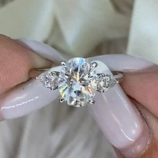 3.6 TCW Oval & Pear Moissanite Three Stone Engagement Ring 14K White Gold Plated