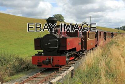 PHOTO  AN INTERNATIONAL GATHERING NO 12 JOAN APPROACHING COPPICE LANE CROSSING W