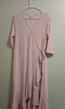 ladies dress pink wrap dress new with out tags to the knee