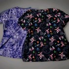 Set Of 2 Scrub Tops. Purple KOI  Xtra Small, Black Scrub STARS MEDIUM  — photo 2