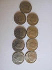 All nine Kennedy Half Dollars mixed dates.