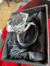 2 x napkin rings .Look like a diamond ring 2''diameter diamond and silver metal