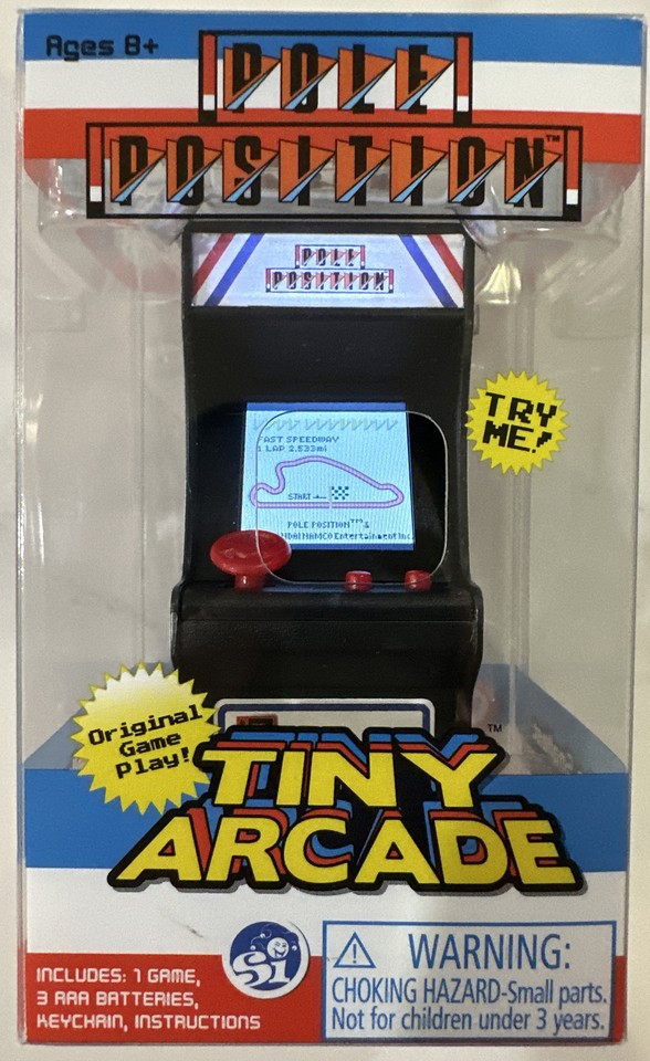 A fully playable Pole Position arcade cabinet shrunk to keychain size — an instant nostalgic hit that actually works.