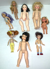 Lot Of 7 Dolls And One Doll Parts No Clothes