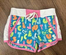 Girls multi-color Justice board shorts Size 7 NWT