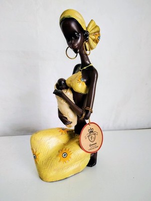 Giovanni Collection Woman With Baby in Yellow Ceramic Figure