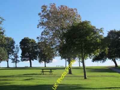 Photo 6x4 Bramley Park: picnic benches Pudsey/SE2233 Several benches spr c2015
