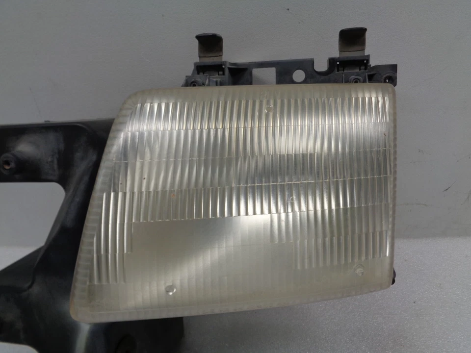 Lámpara de faro izquierdo para conductor Dodge Ram 1500 Van 98-03 con soporte OEM AK2411242 Foto 2 de 4