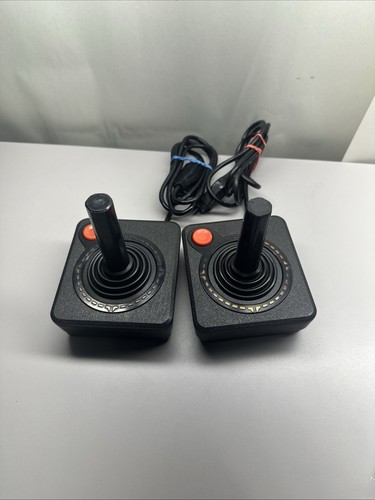 Atari 2600 two (2) original orange trim Original Joysticks ! Working . #1