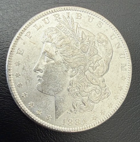 1884 BRILLIANT UNCIRCULATED MORGAN SILVER DOLLAR