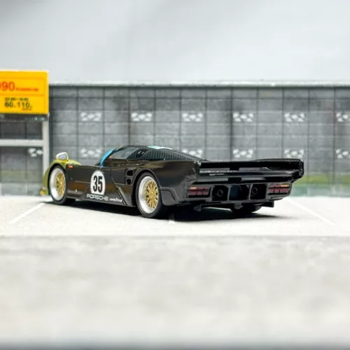 Spark 1:64 Porsche 962 auto display edizione limitata rivestimento mimetico modello in lega - Foto 6 di 8