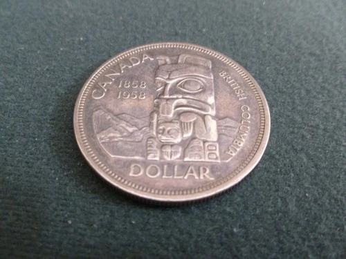 1958 canadian totem pole silver dollar