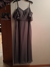 Gray formal dress featuring off the shoulder sleeves and straps w lace-up back