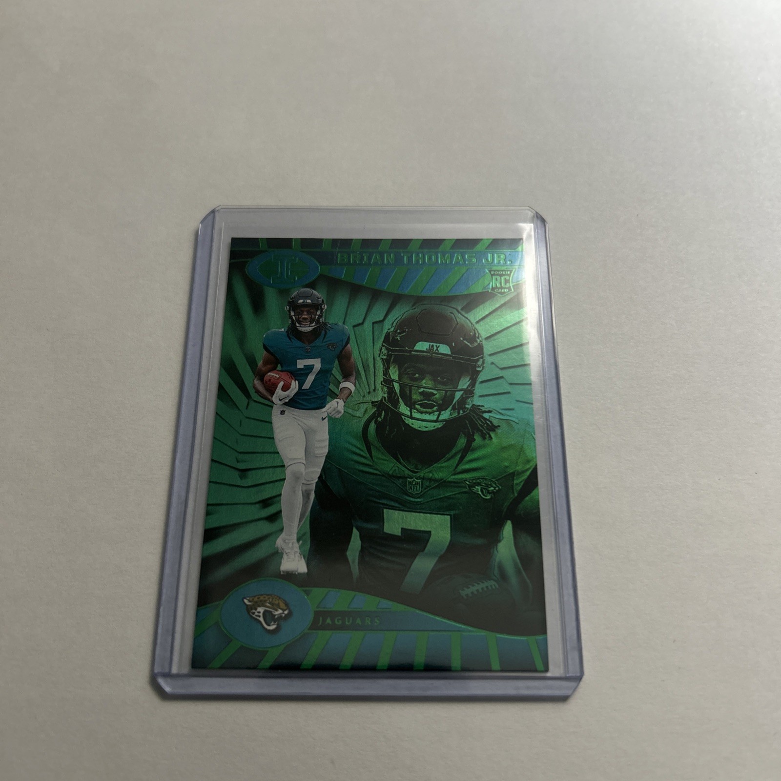 2024 Panini Illusions - Brian Thomas Jr. #41 Trophy Collection Emerald (RC)