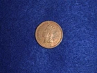 1907 Indian Head Cent nice AU with some mint red