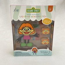 Sesame Street Glo Pals Light Up Sensory Bath Toys Julia Water Activated 2 Cubes
