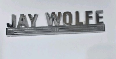Vintage Jay Wolfe  Metal Dealer Badge Emblem Tag 