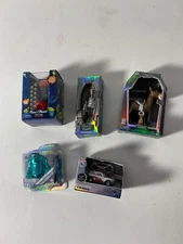 Mini brands toy figurines in boxes.Various collectables