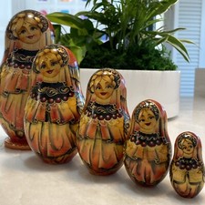 Hand crafted/painted Matreshka set of 5 Signed by Artist made of wood.
