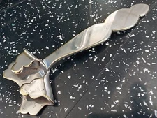 Silver hot plate gripper / holder. 17 centimetres long.