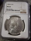 1884 O MS63 $1 (MORGAN)