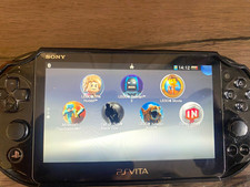 Sony PlayStation Vita Black Handheld System with Minecraft Game Card