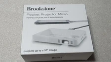 Brookstone Pocket Projector Micro Portable HDMI Mini Projector New