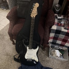 Fender Squire Bullet Strat Six String Electric Guitar With Strap And Case.