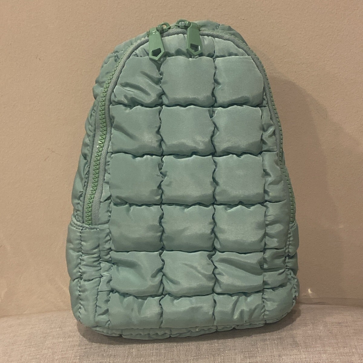 Sol and Selene Rejuvenate Quilted Puffy Sling Pack Bag Pistachio Green Backpack Sol and Selene Rejuvenate Quilted Sling Pack Bag Pistachio  main image 3