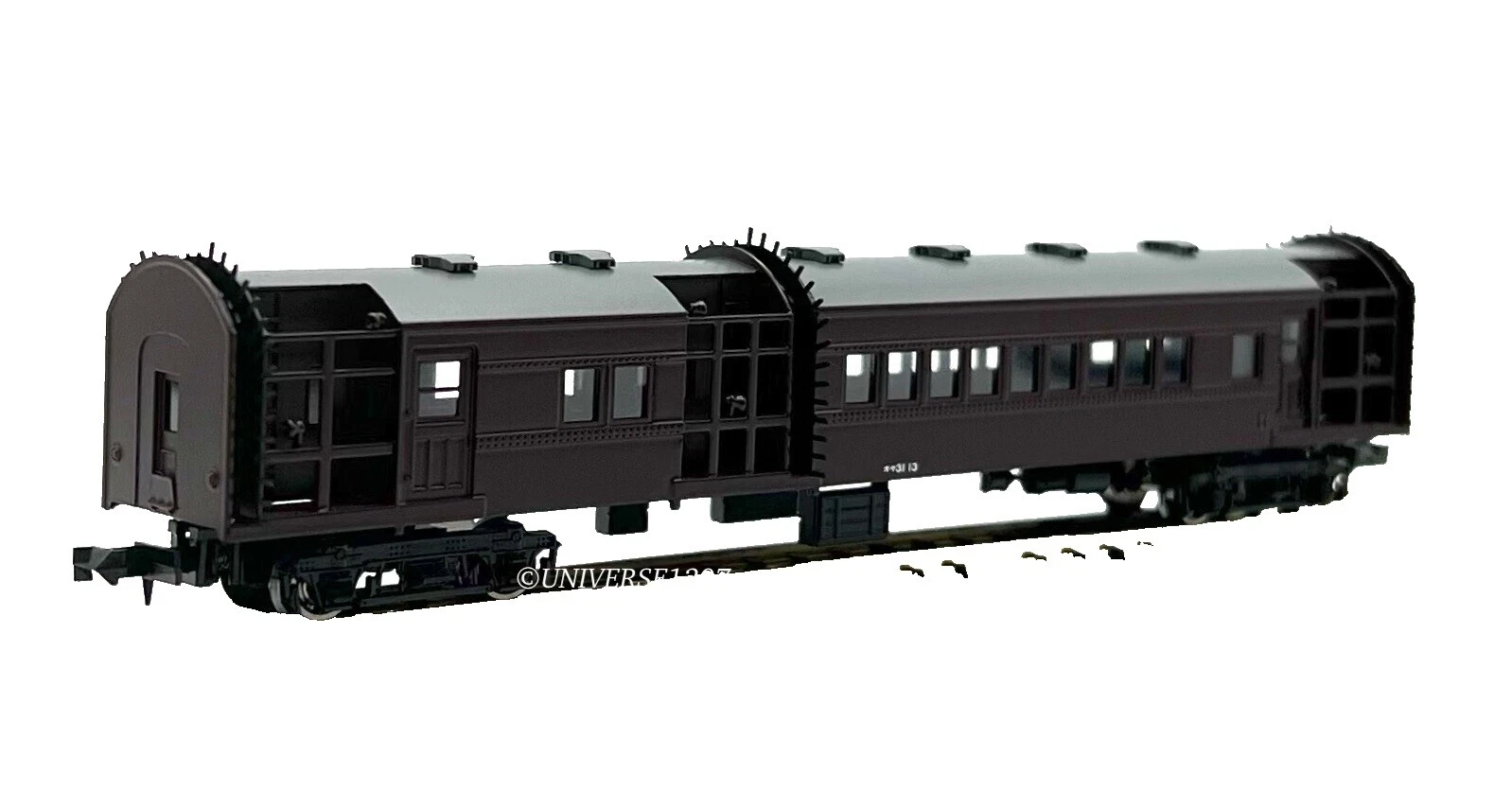 Modelo de metal blanco marrón de trenes