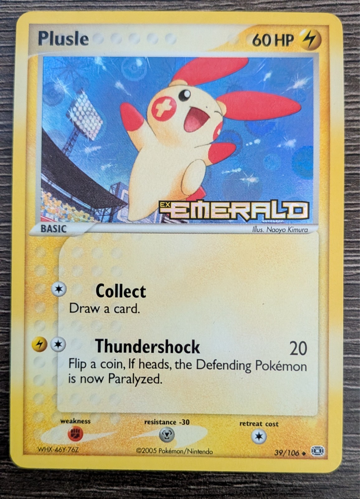 Plusle 39/106 Emerald Reverse Holo Stamped Near Mint