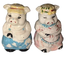 ￼Vintage ceramic salt and pepper shakers Boy And Girl Pigs