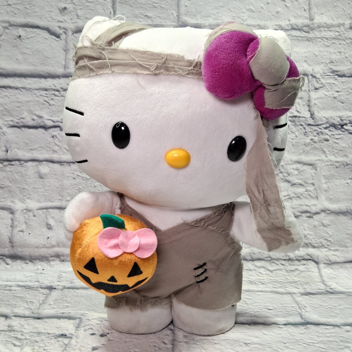Hello Kitty BRAND NEW with tags mummy side stepper.... | Depop HELLO KITTY Halloween Greeter Plush Musical Mummy Sidestepper main image 2