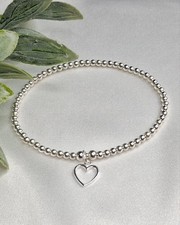 Sterling Silver Bead Elasticated Stretch Bracelet With A Heart Charm