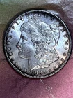 1886 P   Morgan Dollar  CH BU +   ORIGINAL TONING Dollars starting at  .99