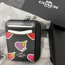[COACH] Zip card case lightning heart design