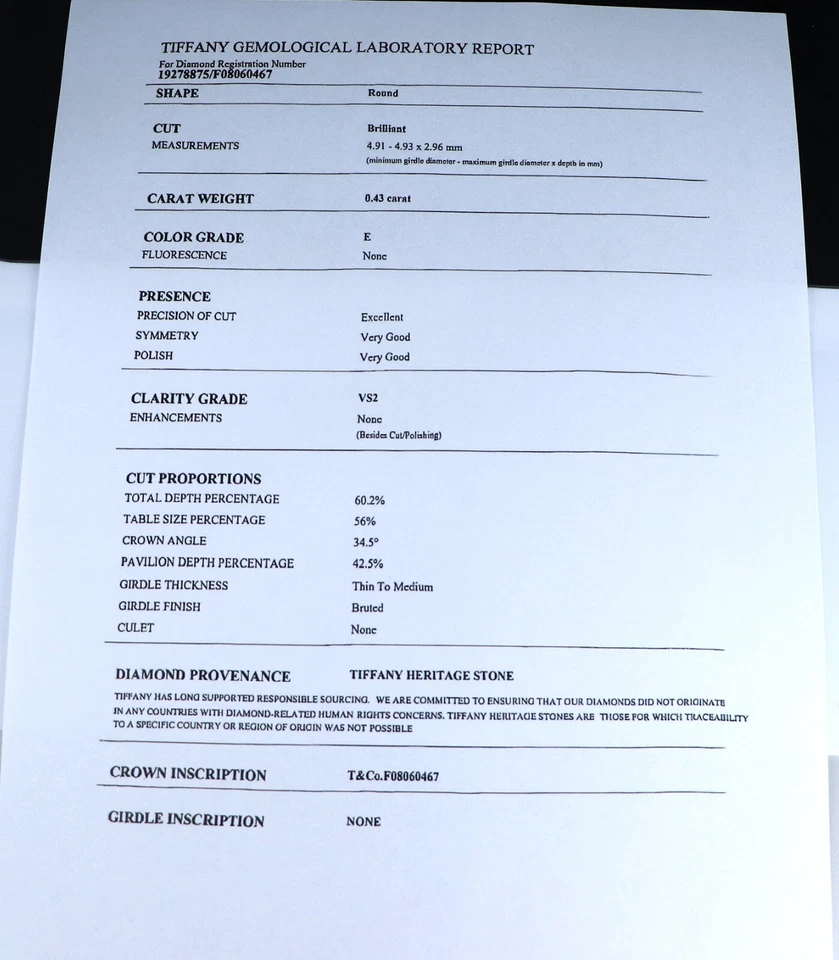 Anillo de compromiso de diamantes redondos de platino con cinta de 0,43 quilates E VS2 $6,950 Tiffany Co 4,5 Foto 4 de 4