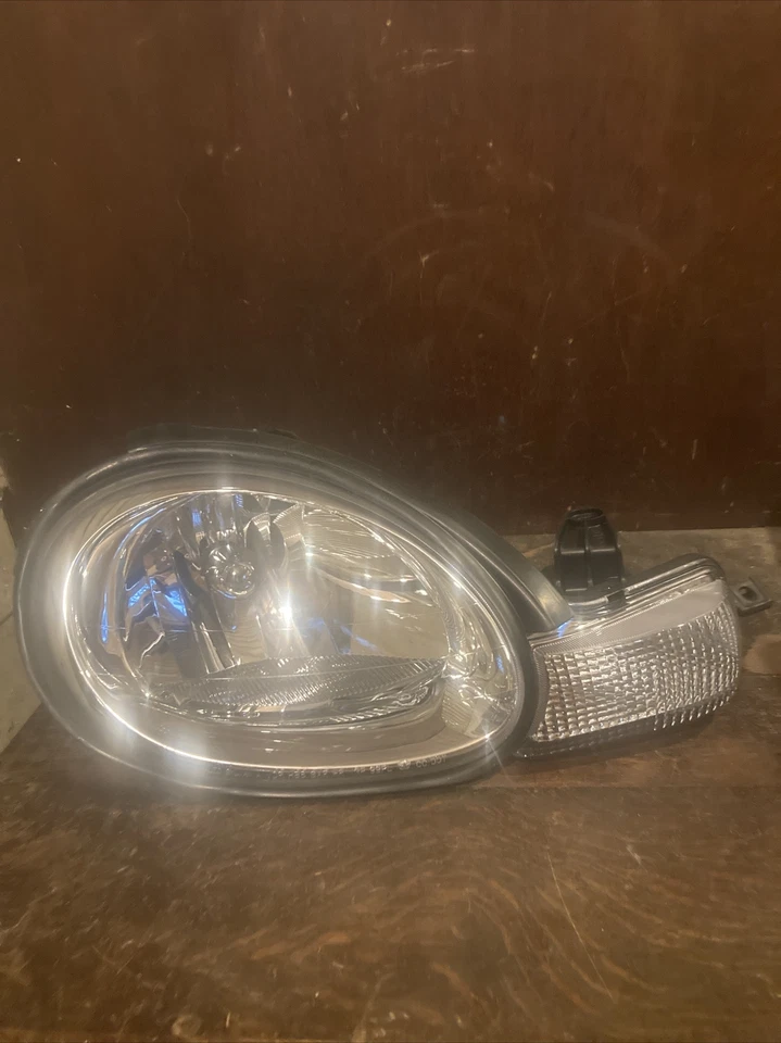 Conjunto de faros laterales para pasajeros Mopar 05288508AH Dodge Neon 2000-2005 nuevo de fábrica OEM Foto 2 de 4